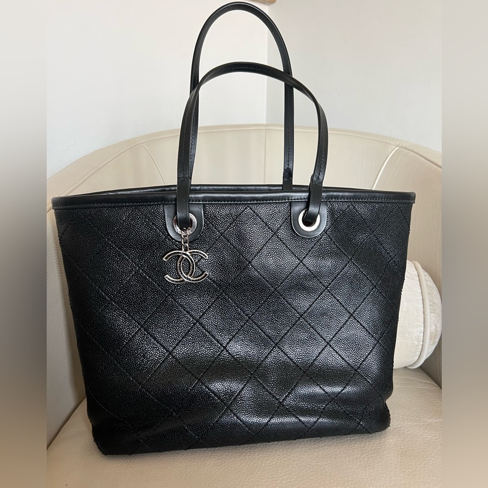 Worn carefully with love 
Chanel caviar tote